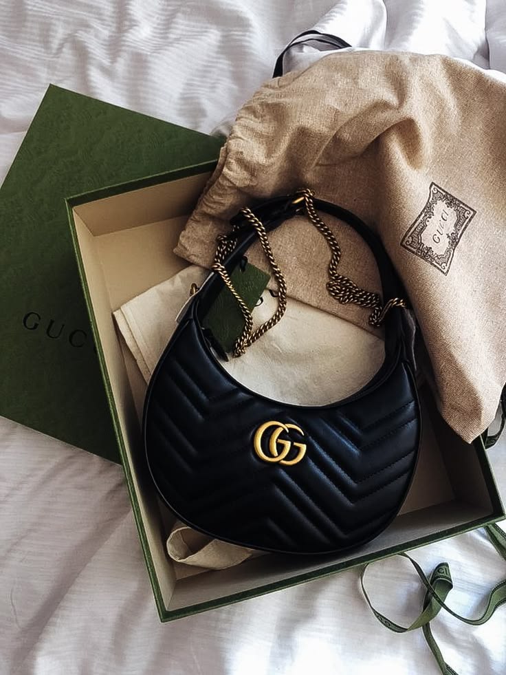 Gucci GG Marmont Half-Moon Shaped Mini Bag.