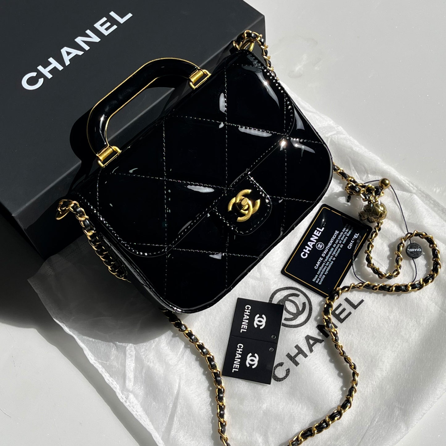 CHANEL | Metallic Mirror Calfskin Large Top Handle Clutch With Chain