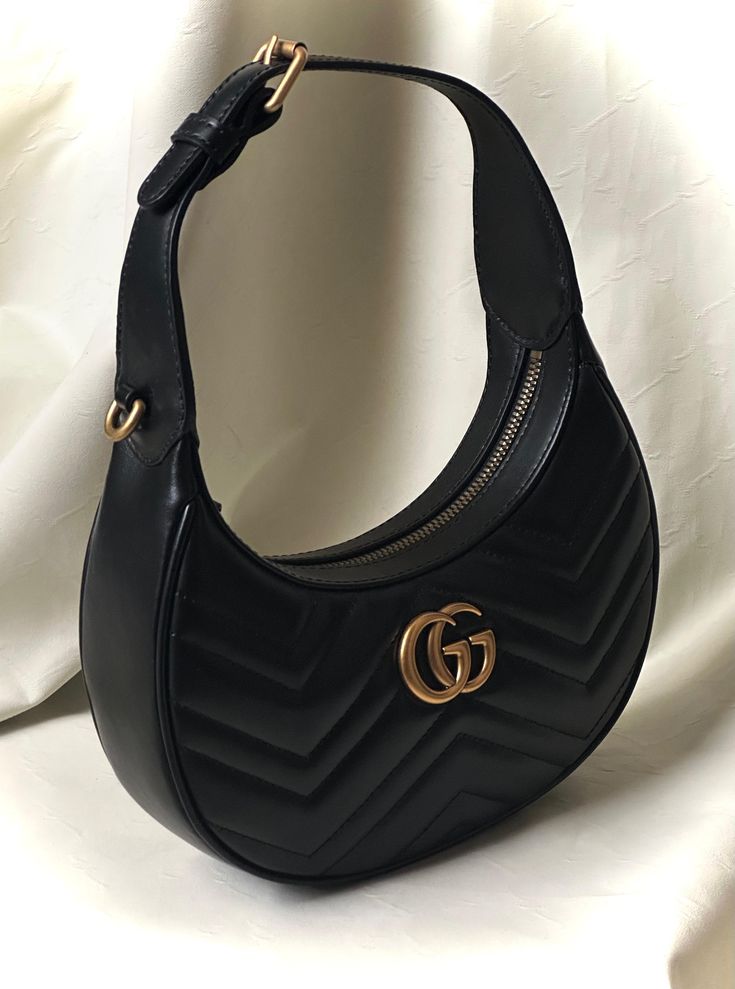 Gucci GG Marmont Half-Moon Shaped Mini Bag.
