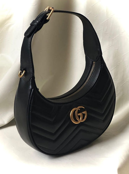 Gucci GG Marmont Half-Moon Shaped Mini Bag.